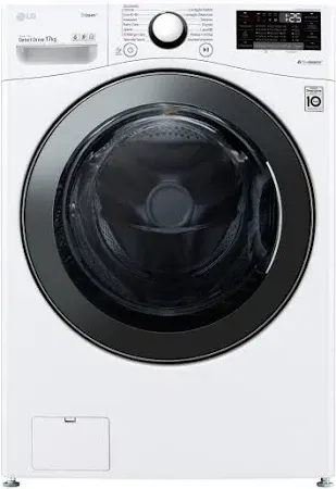 Técnico realizando la reparación de una lavadora en un hogar de Torrent, demostrando habilidad y precisión para asegurar un funcionamiento óptimo del aparato.
